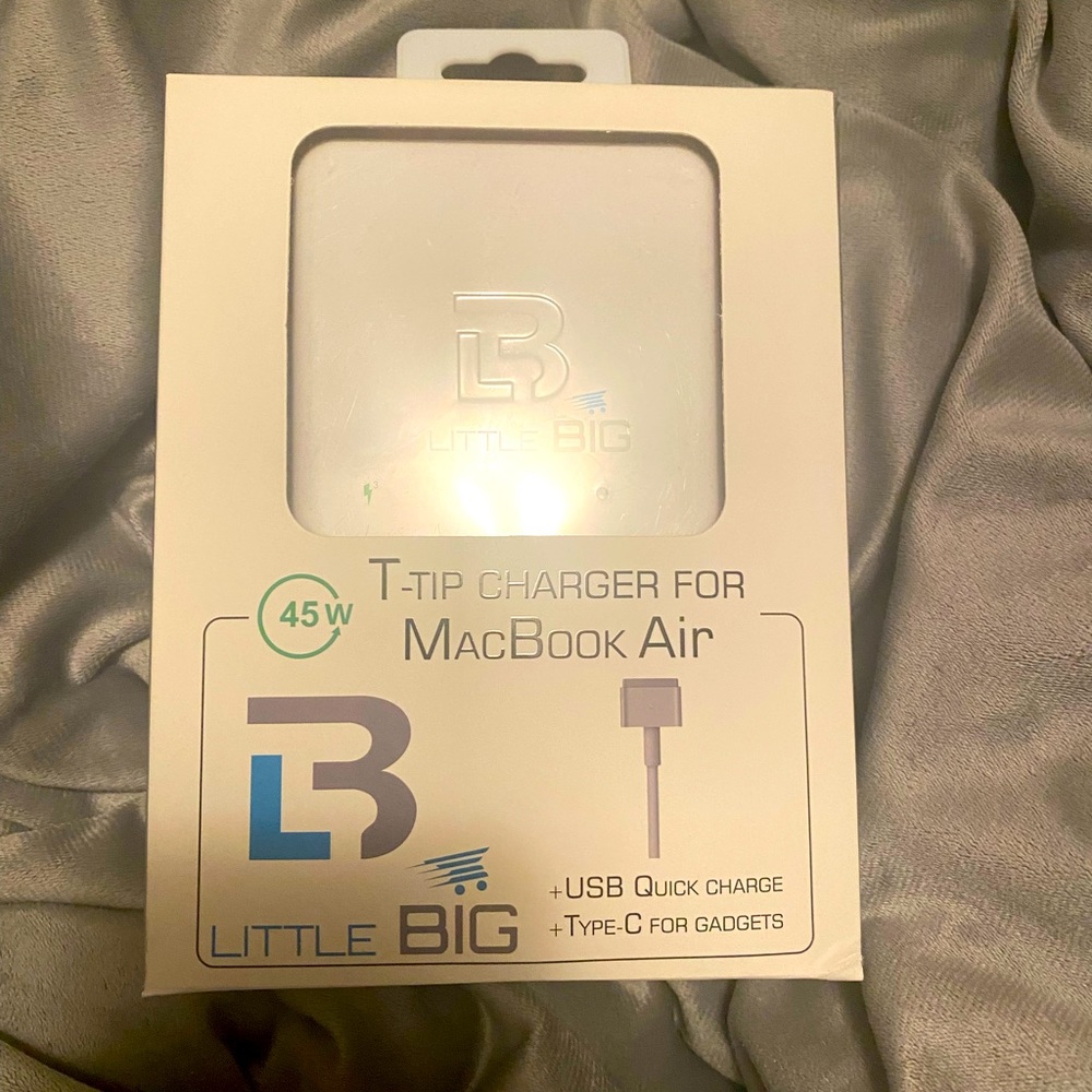 MacBook Air charger. 45w. Additional USB & Type-C charge for other gadgets.